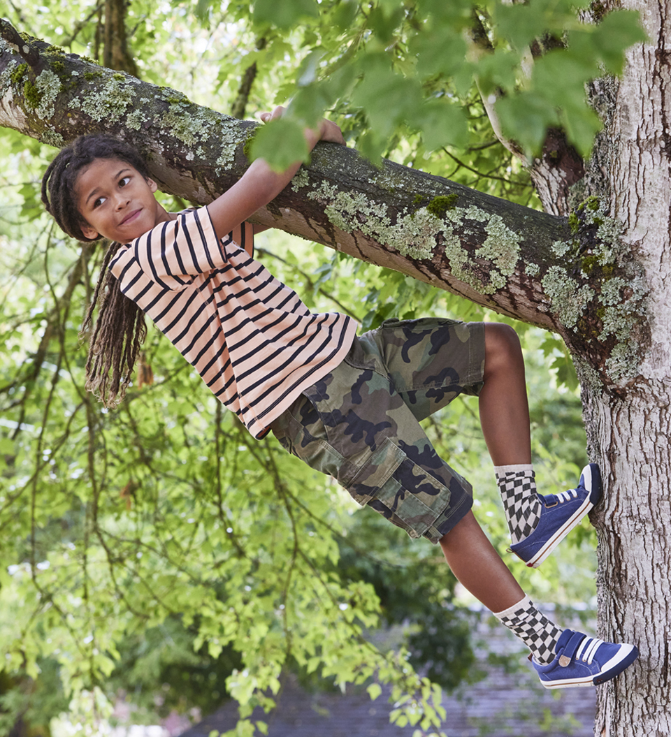 Boy Climbing Tree