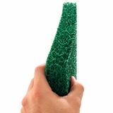 Hand holding the edge of a green replacement Matala filter mat for an Elite Waterfall Box, showing its thickness and open structure.