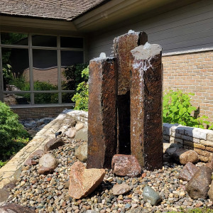 Tall Rustic Basalt Fountains in a triple set Tall Rustic Basalt Fountains in a triple set