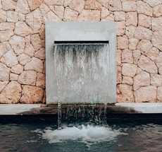Keep Your Water Moving with a Waterfall Spillway