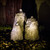 Single GFRC Medium Matterhorn Fountain in a triple setting at night