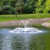 Airmax EcoSeries crown and arch nozzle pond spray pattern view on a 1/2 HP EcoSeries Fountain