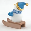 SLEDDING SNOWMAN