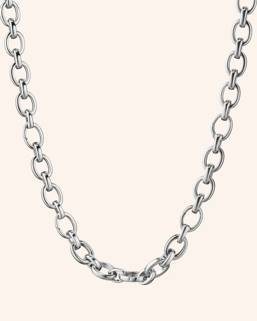 "AUDREY" LINK CHARM NECKLACE IN STERLING SILVER With five hinged links to add your own charms.