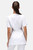 Back view of La Beeby Diamante tunic in white – embroidered beauty and salon uniform