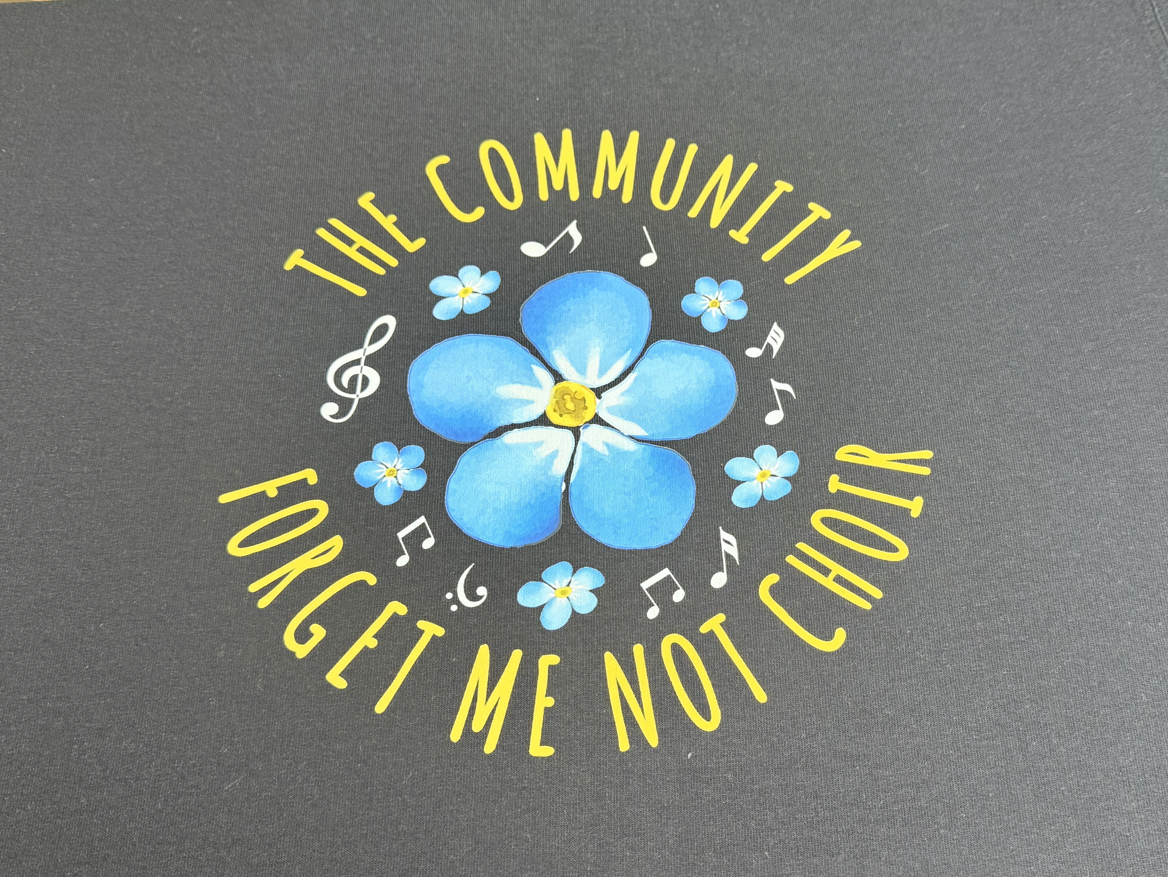 Close-up of DTF printed logo on workwear garment