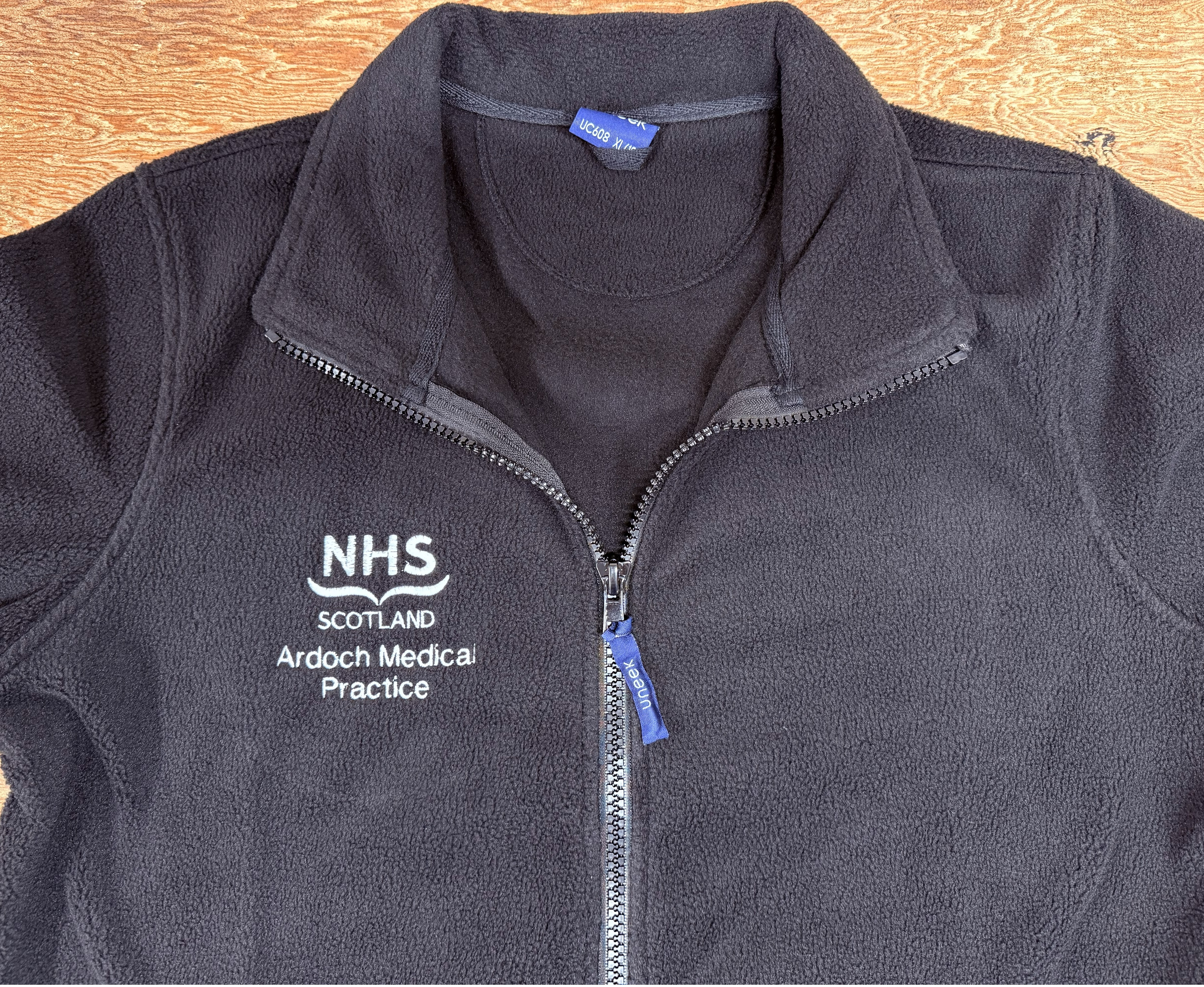 Embroidered logo on workwear fleece jacket