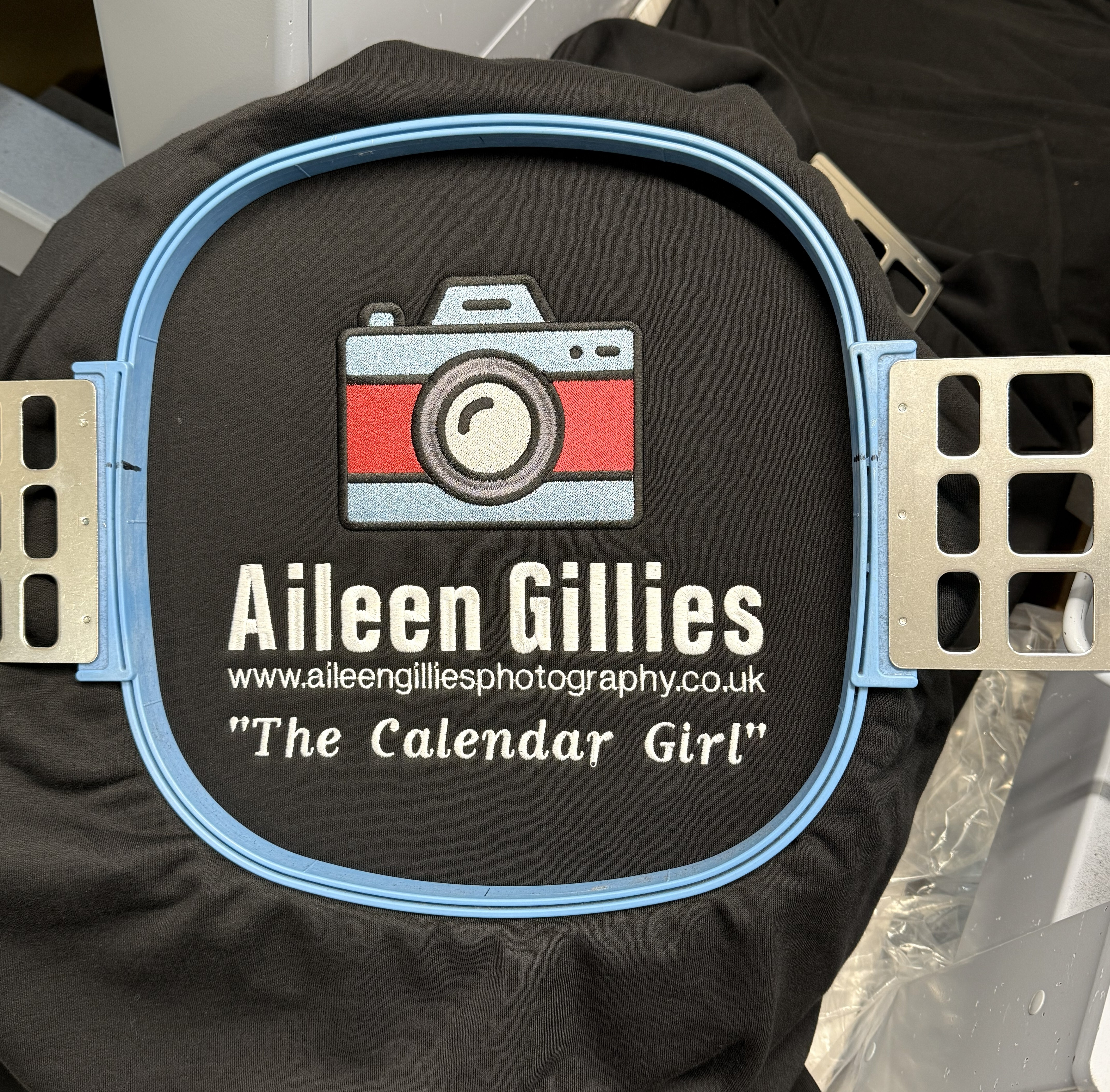 Large centre back embroidery on a Black Hoodie