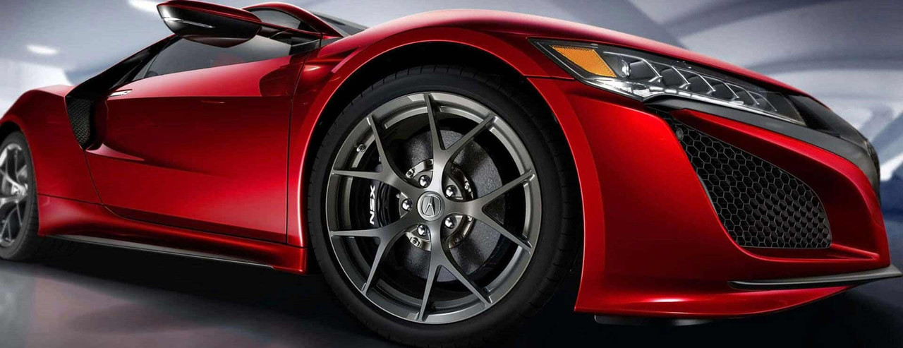 Image of new factory OEM wheels on a Nissan NSX