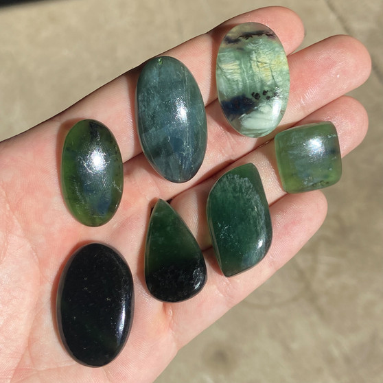 Serpentine Cabochon Parcel in a hand