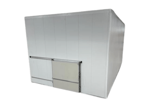 Large white drive-in cooler with sliding door and insulated panel walls