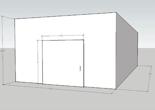 Large white drive-in cooler with sliding door and insulated panel walls
