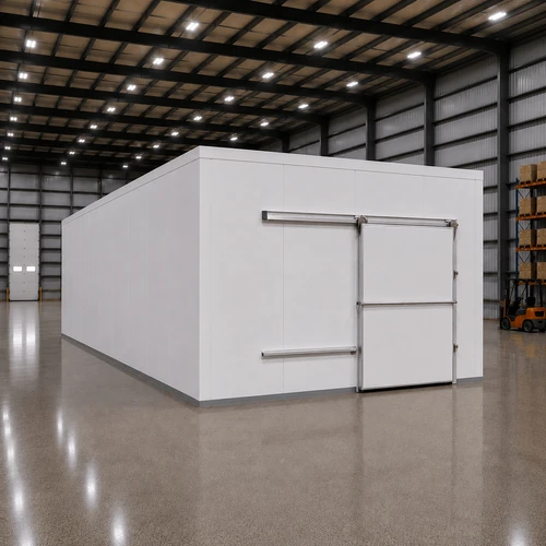 Large white drive-in freezer with sliding door and insulated panel walls