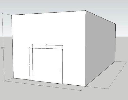 Large white drive-in freezer with sliding door and insulated panel walls