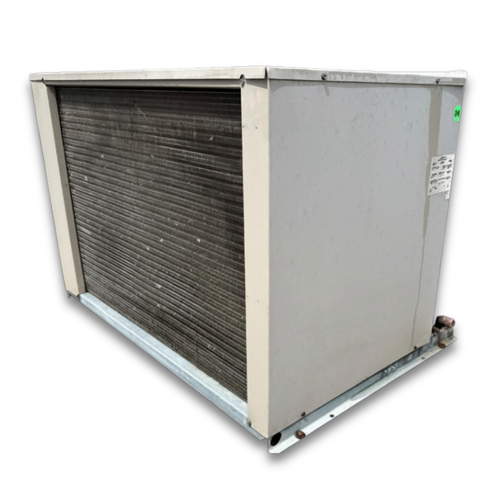 Used beige condensing unit backside view.
