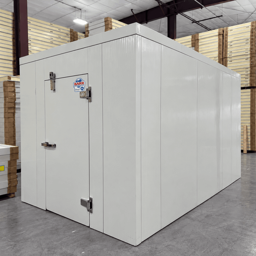 White walk-in cooler unit with open hinged door, featuring insulated panel walls