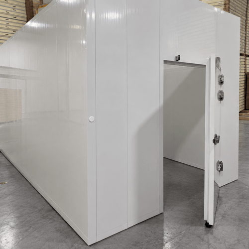 White walk-in cooler unit with open hinged door, showing interior and insulated panel walls