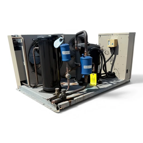 Front-left view of a used Climate Control CHN029M2D 2.5 HP indoor condensing unit #670, an enclosed cabinet with a compressor compartment and fan.