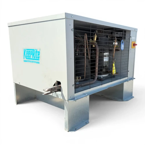 Front-left view of the used Keeprite KEZA025L8-HT4D-2EC 2.5 HP condensing unit, showing the KeepRite logo on the cabinet side panel.