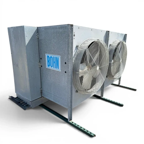 Front-left view of a used Bohn PG-2502D evaporator #3045, a gray penthouse-style fan coil unit with two large round wire-grille fans and green support legs.