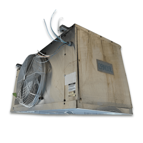 Front-right view of the used Cancoil EMPS-16212B evaporator #3023, showing the cabinet side panel and rating labels.