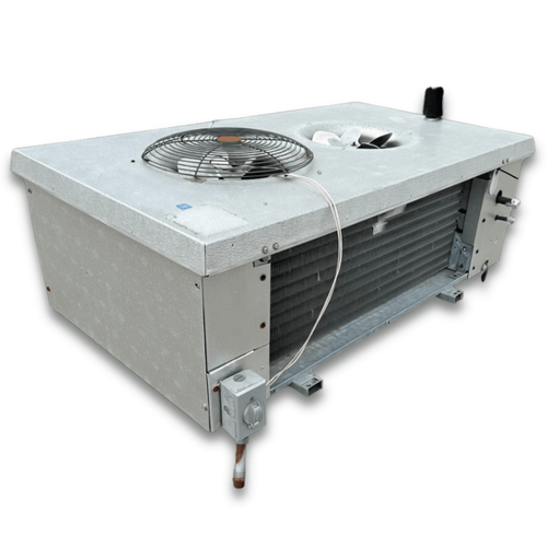 Used gray evaporator with two fans front side view showing labels.
