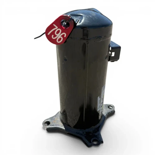 Front view of the used Copeland ZR30K3-TF5 2.5 HP scroll compressor, 3 phase 208-230 volt, showing the rating nameplate reading "ZR30K3-TF5-230", blue port caps, a terminal box bracket, and orange/yellow multilingual warning labels.
