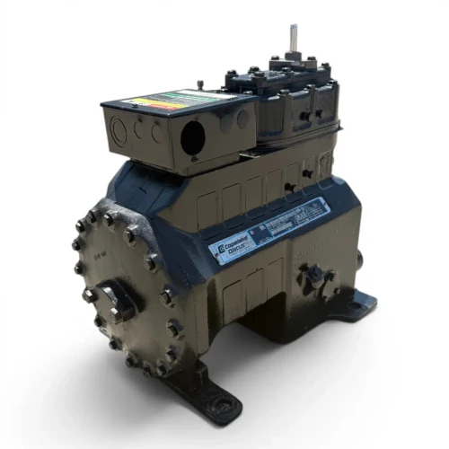 Front view of a used Copeland 3DHH-F28KL-TFD 6 HP compressor (3 phase 460 volt), a black cast housing with the "Copeland Discus" nameplate, a black terminal box, and a metal shaft/valve stem protruding from the top cylinder head.