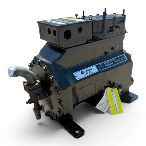 Straight-on front view of the used Copeland 3DB3A-075E-TFC 7.5 HP compressor, 3 phase 208-230 volt, with a black housing, blue Copeland Discus nameplate, and a foil-wrapped copper suction line at the left.