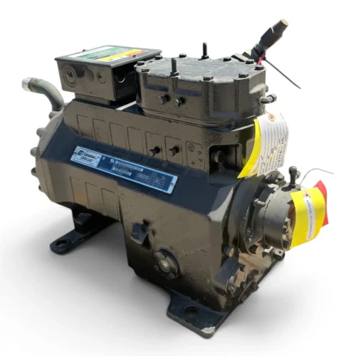 Closer front-right three-quarter view of the used Copeland 3DF3-R15ML-TFC 12 HP compressor, showing a white paper service tag hanging from the top cap and the yellow "Add Oil to Compressor" tag draped over the end bell valve.