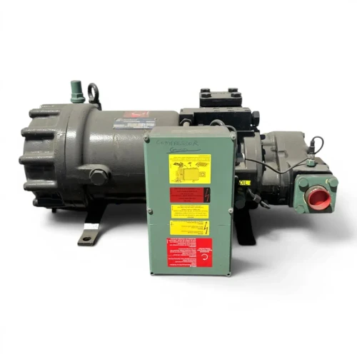 Front view of the used Copeland SHL1-2000-TWK 20 HP compressor, 3 phase Dual Voltage, with the green terminal box cover open showing a handwritten "COMPRESSOR GOOD" note and printed caution/danger labels, plus a red-capped oil port fitting visible on the right side.