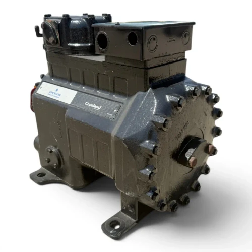 Back-right view of the used Copeland 2DD3-R63KE-TFC 5 HP Discus compressor (3 phase, 208-230 volt), showing the heavily bolted rear valve-plate flange with cast "1350 600" marking and the Emerson/Copeland nameplate visible at the edge.