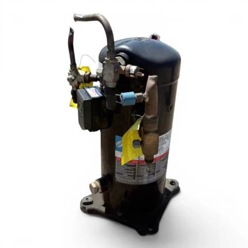 Front-right view of the used Copeland ZF18KVE-TFD 6 HP compressor, showing a red inventory tag numbered "461", a yellow "ADD OIL TO COMPRESSOR" tag, and a rusted service valve fitting.