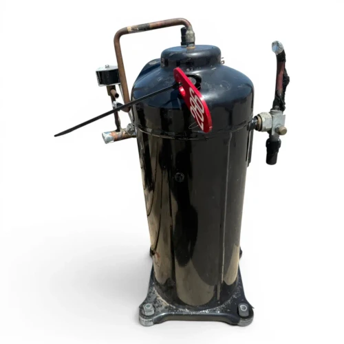 Front-right view of a used Copeland ZFD18KVE-TF5 6 HP scroll compressor (3 phase 208-230 volt), showing a red inventory tag numbered "286", a copper carrying-handle loop at the top, and the terminal box with service valves on the left.