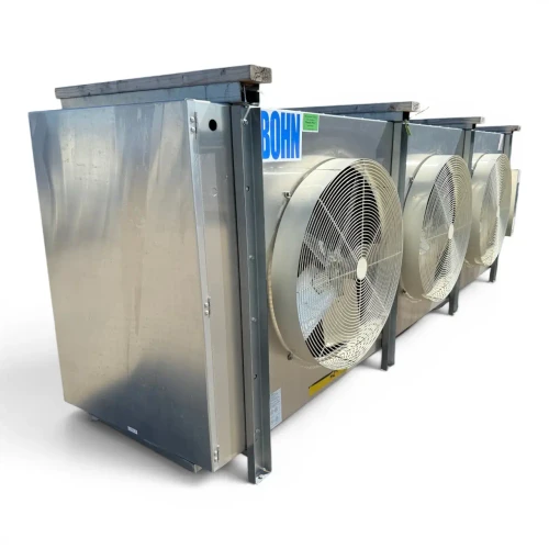 Front-left view of a used Bohn BHE-1200DA evaporator, a large three-fan cream-colored fan coil unit with wood shipping blocks and a Beacon II defrost control.