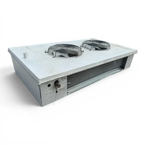 Front-left view of a used Hussmann GAL24-90ED low velocity evaporator #1030, a white fan coil unit with two round black-grille fans and Hussmann label.