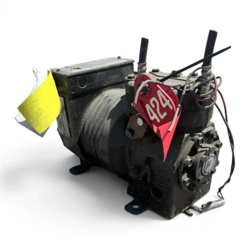 Front-right view of the used Copeland KARA-010E-TAC 1 HP compressor - 11831, showing the rating plate reading "Copelametic KARA-010E-TAC-220," a yellow tag peeling from the terminal box, and the red "424" tag with a "50 PSIG / NITROGEN" caution marking.