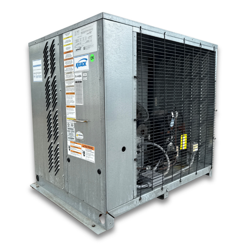 Gray condensing unit with front side view showing labels.