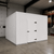 Large white drive-in cooler with swing door and insulated panel walls