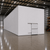 Large white drive-in cooler with sliding door and insulated panel walls