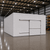 Large white drive-in freezer with sliding door and insulated panel walls