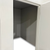 White walk-in cooler unit with closed hinged door and insulated panel walls inside view