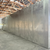 Silver drive-in cooler outside view showing wall