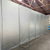 Silver metal walk-in cooler back view