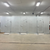 Silver galvanized walk-in freezer with floor exterior front straight on view.