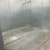 Silver galvanized walk-in freezer with floor interior view.