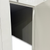 White walk-in cooler unit with closed hinged door, featuring insulated panel walls inside view