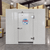 White walk-in commercial freezer with a closed door