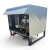Front-right view of the used Hussmann HICA0304SLKGF condensing unit #570, showing the equipment frame, control components, and support legs.
