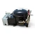 Rear-right angled view of the used RST64-C1E-CAV .75 HP compressor, showing the open terminal box with wiring and a round white component exposed, the red "737" tag, warning labels on the shell, and the black cast mounting feet.